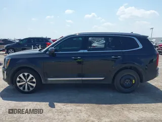 2022 Kia Telluride S with VIN 5XYP64HC1NG227783, listed as a IAAI auction lot 41897694 with 95,713 mi miles and . Bid and sale history available at DreamBid. Image 13.