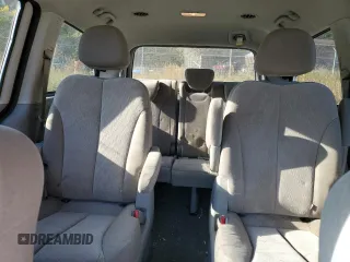 2012 Kia Sedona LX with VIN KNDMG4C77C6503605, listed as a Copart auction lot 77481894 with 103,026 mi miles and Salvage Title. Bid and sale history available at carsss.com. Image 10.
