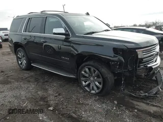 2015 Chevrolet Tahoe LTZ z VIN 1GNSKCKCXFR519161, wystawiony jako IAAI lot #40858056 z przebiegiem 106 676 mil mil oraz . Historia ofert i sprzedaży dostępna na DreamBid. Obrazek 1.