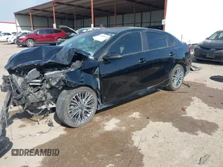 2023 Kia Forte GT-Line z VIN 3KPF54AD6PE670383, wystawiony jako IAAI lot #42020078 z przebiegiem 26 169 mil mil oraz . Historia ofert i sprzedaży dostępna na DreamBid. Obrazek 2.