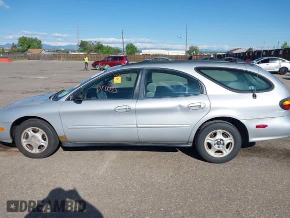 1996 Ford Taurus GL z VIN 1FALP57U9TG184497, wystawiony jako IAAI lot #42290105 z przebiegiem 149 155 mil mil oraz . Historia ofert i sprzedaży dostępna na DreamBid. Obrazek 14.