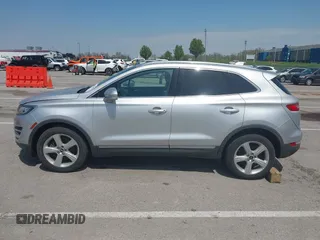2015 Lincoln MKC with VIN 5LMCJ2A94FUJ16038, listed as a IAAI auction lot 42057400 with 102,848 mi miles. Bid and sale history available at carsss.com. Image 14.
