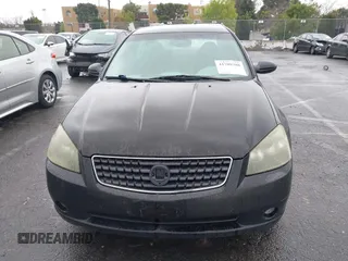 2006 Nissan Altima S with VIN 1N4AL11DX6N432650, listed as a IAAI auction lot 41789388 with 239,071 mi miles and . Bid and sale history available at DreamBid. Image 12.