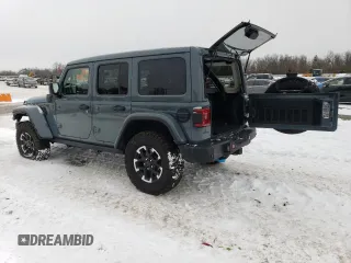 2024 Jeep Wrangler Rubicon with VIN 1C4RJXR66RW237347, listed as a Copart auction lot 88774995 with 18,018 mi miles and Salvage Title. Bid and sale history available at DreamBid. Image 2.