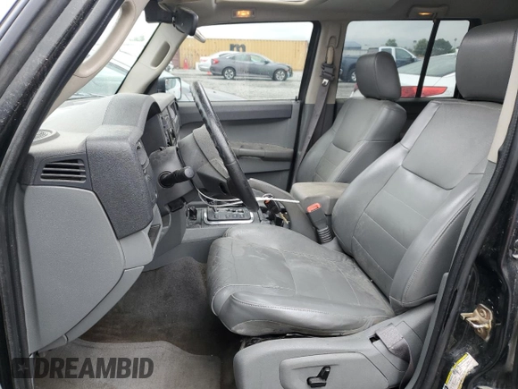 2006 Jeep Commander z VIN 1J8HH48K86C289122, wystawiony jako Copart lot #55810935 z przebiegiem 140 063 mil mil oraz Szkoda całkowita • Salvage title. Historia ofert i sprzedaży dostępna na DreamBid. Obrazek 7.
