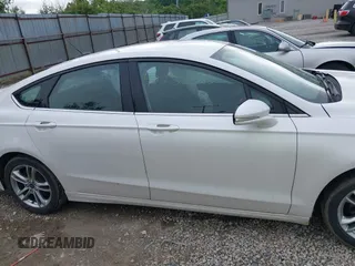 2016 Ford Fusion SE Hybrid with VIN 3FA6P0LU7GR356479, listed as a IAAI auction lot 42252046 with 119,046 mi miles and . Bid and sale history available at DreamBid. Image 13.