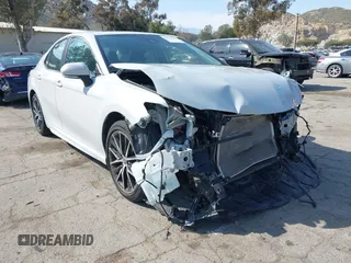 2023 Toyota Camry SE with VIN 4T1T11AK8PU138805, listed as a IAAI auction lot 41977827 with 19,661 mi miles and . Bid and sale history available at DreamBid. Image 18.