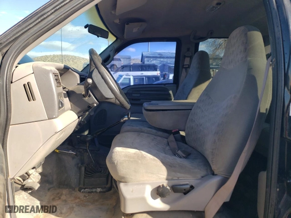1999 Ford Super Duty F-250 XL with VIN 1FTNW21L7XEE25365, listed as a Copart auction lot 88460705 with 173,545 mi miles and Clean Title. Bid and sale history available at carsss.com. Image 7.