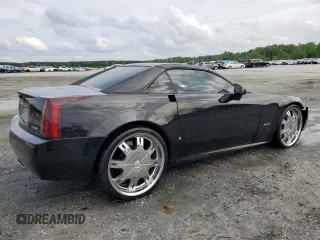 2006 Cadillac XLR z VIN 1G6YV36A265600782, wystawiony jako Copart lot #54352705 z przebiegiem 94 678 mil mil oraz Szkody całkowita. Historia ofert i sprzedaży dostępna na DreamBid. Obrazek 3.