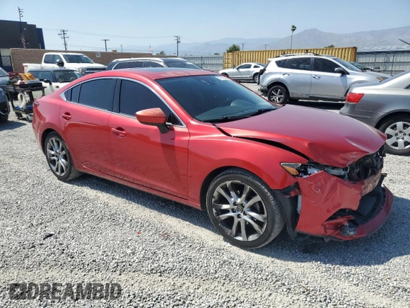 2014 Mazda 6 i Grand Touring с VIN JM1GJ1W64E1121399, выставлен на аукционе Copart как лот 57513405 с пробегом 161 286 миль миль и Списание • Salvage title. История ставок и продаж доступна на DreamBid. Изображение 4.