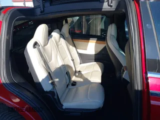 2020 Tesla Model X Long Range with VIN 5YJXCDE22LF217014, listed as a IAAI auction lot 41845824 with 149,375 mi miles and . Bid and sale history available at DreamBid. Image 8.