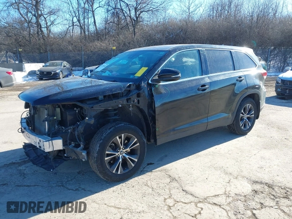 2019 Toyota Highlander LE with VIN 5TDBZRFH0KS964145, listed as a IAAI auction lot 41390943 with 127,163 mi miles and . Bid and sale history available at DreamBid. Image 2.