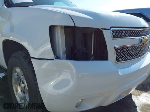 2013 Chevrolet Suburban LT with VIN 1GNSKJE75DR174167, listed as a IAAI auction lot 42005614 with 290,223 mi miles and . Bid and sale history available at DreamBid. Image 6.