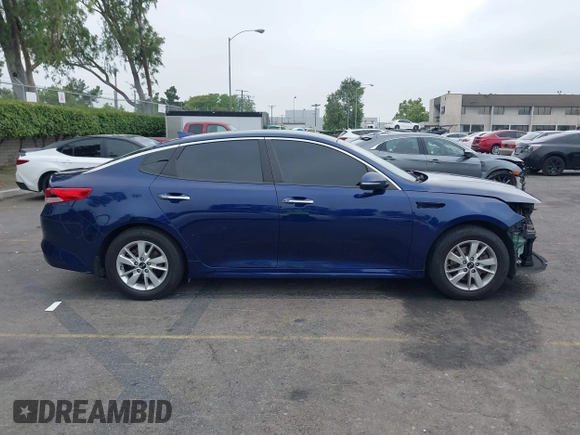 2017 Kia Optima LX z VIN 5XXGT4L32HG142220, wystawiony jako IAAI lot #42407297 z przebiegiem 139 731 mil mil oraz . Historia ofert i sprzedaży dostępna na DreamBid. Obrazek 14.