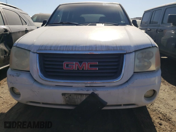 2002 GMC Envoy SLT with VIN 1GKDS13SX22184163, listed as a Copart auction lot 86400894 with 0 mi miles and Salvage Title. Bid and sale history available at carsss.com. Image 5.