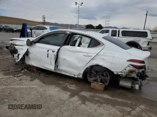 2022 Genesis G70 3.3T with VIN KMTG54TE3NU102585, listed as a Copart auction lot 49923945 with 34,974 mi miles and Salvage title. Bid and sale history available at DreamBid. Image 2.
