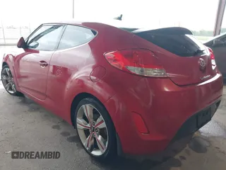2014 Hyundai Veloster z VIN KMHTC6AD3EU201508, wystawiony jako IAAI lot #42353066 z przebiegiem 140 032 mil mil oraz . Historia ofert i sprzedaży dostępna na DreamBid. Obrazek 3.