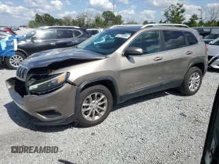 2019 Jeep Cherokee Latitude z VIN 1C4PJMCBXKD229698, wystawiony jako Copart lot #52708095 z przebiegiem 61 534 mil mil oraz Szkoda całkowita • Salvage title. Historia ofert i sprzedaży dostępna na DreamBid. Obrazek 1.