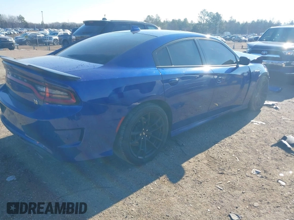 2021 Dodge Charger Scat Pack Widebody with VIN 2C3CDXGJ4MH619280, listed as a IAAI auction lot 41270410 with 59,939 mi miles. Bid and sale history available at carsss.com. Image 4.