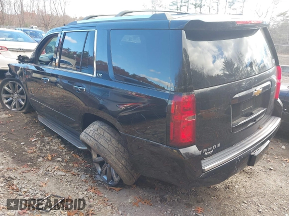 2015 Chevrolet Tahoe LTZ z VIN 1GNSKCKC3FR584689, wystawiony jako IAAI lot #41505580 z przebiegiem 37 012 mil mil oraz . Historia ofert i sprzedaży dostępna na DreamBid. Obrazek 3.