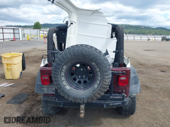 2003 Jeep Wrangler X z VIN 1J4FA39S73P349014, wystawiony jako IAAI lot #42582747 z przebiegiem 50 525 mil mil oraz . Historia ofert i sprzedaży dostępna na DreamBid. Obrazek 17.