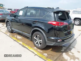 2017 Toyota RAV4 XLE with VIN 2T3WFREV9HW340451, listed as a IAAI auction lot 41937327 with 107,212 mi miles. Bid and sale history available at carsss.com. Image 3.