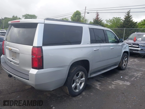 2015 Chevrolet Suburban LT z VIN 1GNSCJKC2FR144528, wystawiony jako IAAI lot #42320028 z przebiegiem 226 076 mil mil oraz . Historia ofert i sprzedaży dostępna na DreamBid. Obrazek 4.