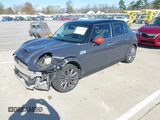 2015 MINI Hardtop 4 Door S with VIN WMWXU3C57FT892179, listed as a IAAI auction lot 42092010 with 95,156 mi miles and . Bid and sale history available at DreamBid. Image 2.