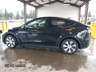 2023 Tesla Model Y Long Range with VIN 7SAYGAEE7PF739924, listed as a IAAI auction lot 41612323 with 75,226 mi miles and . Bid and sale history available at DreamBid. Image 13.
