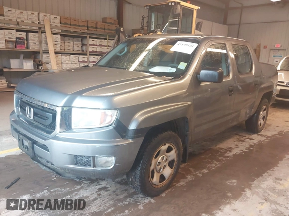 2009 Honda Ridgeline RT with VIN 5FPYK16279B104907, listed as a IAAI auction lot 42197433 with 244,260 mi miles. Bid and sale history available at carsss.com. Image 2.