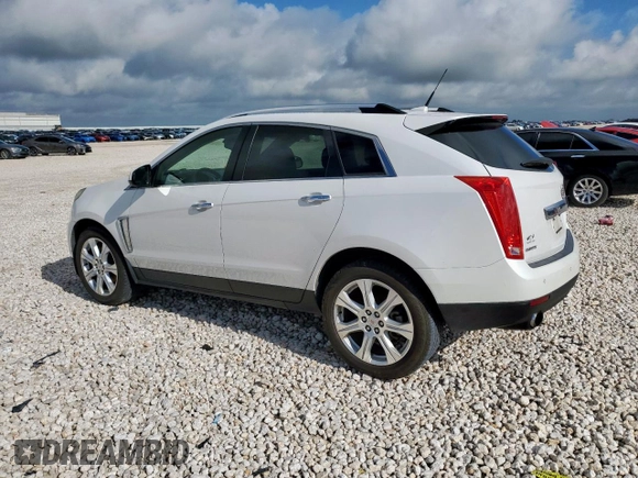 2014 Cadillac SRX Performance Collection with VIN 3GYFNCE39ES687733, listed as a Copart auction lot 62770665 with 151,714 mi miles and Salvage title. Bid and sale history available at DreamBid. Image 2.