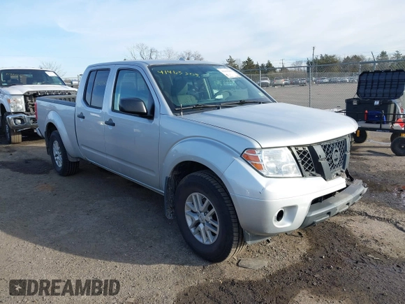 2014 Nissan Frontier SL z VIN 1N6AD0FV3EN767134, wystawiony jako IAAI lot #41463305 z przebiegiem 63 553 mil mil oraz . Historia ofert i sprzedaży dostępna na DreamBid. Obrazek 1.
