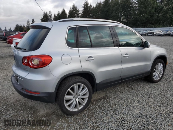 2011 Volkswagen Tiguan SE with VIN WVGBV7AX1BW559924, listed as a Copart auction lot 53914175 with 215,511 mi miles and Clean Title. Bid and sale history available at DreamBid. Image 3.