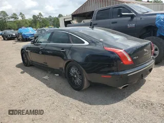 2015 Jaguar XJ with VIN SAJWA2GZXF8V88962, listed as a Copart auction lot 53919035 with 129,987 mi miles and Salvage Title. Bid and sale history available at carsss.com. Image 2.