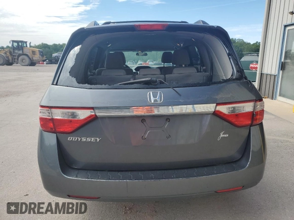 2012 Honda Odyssey LX с VIN 5FNRL5H21CB009359, выставлен на аукционе Copart как лот 57669225 с пробегом 162 757 миль миль и Списание • Salvage title. История ставок и продаж доступна на DreamBid. Изображение 6.