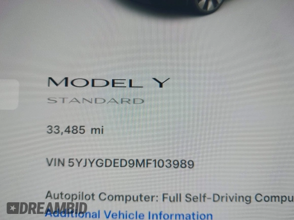 2021 Tesla Model Y Standard Range with VIN 5YJYGDED9MF103989, listed as a IAAI auction lot 41482268 with 33,485 mi miles and . Bid and sale history available at DreamBid. Image 9.