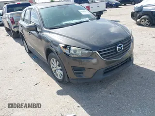2016 Mazda CX-5 Sport with VIN JM3KE2BY1G0813373, listed as a IAAI auction lot 42787131 with Not provided miles and . Bid and sale history available at DreamBid. Image 1.