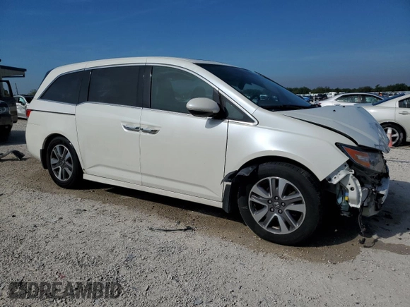 2014 Honda Odyssey Touring with VIN 5FNRL5H98EB059790, listed as a Copart auction lot 50547555 with Not Provided miles and Salvage Title. Bid and sale history available at DreamBid. Image 4.