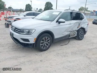 2018 Volkswagen Tiguan SEL with VIN 3VV2B7AX1JM006316, listed as a IAAI auction lot 40084803 with 91,459 mi miles. Bid and sale history available at carsss.com. Image 2.