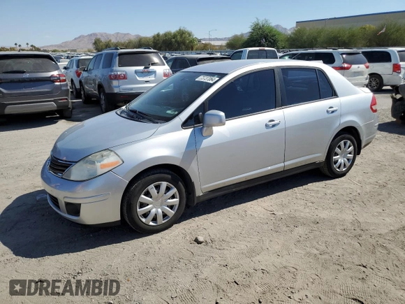 2011 Nissan Versa S with VIN 3N1BC1AP0BL410081, listed as a Copart auction lot 73737064 with 201,142 mi miles and Salvage title. Bid and sale history available at DreamBid. Image 1.