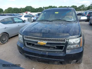 2014 Chevrolet Suburban LTZ with VIN 1GNSCKE08ER220808, listed as a IAAI auction lot 42022477 with 192,488 mi miles. Bid and sale history available at carsss.com. Image 12.