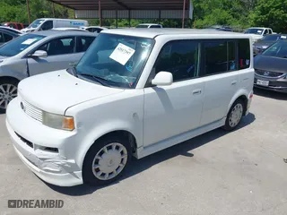 2006 Scion xB with VIN JTLKT324464115742, listed as a IAAI auction lot 42017397 with 203,140 mi miles. Bid and sale history available at carsss.com. Image 2.