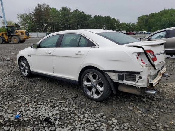 2012 Ford Taurus SHO with VIN 1FAHP2KT2CG141879, listed as a Copart auction lot 56558365 with 105,230 mi miles and Salvage title. Bid and sale history available at DreamBid. Image 2.