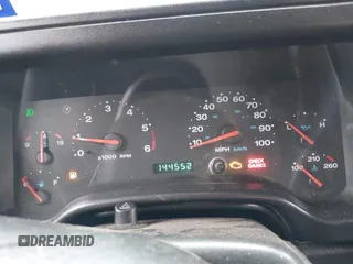 2005 Jeep Wrangler Sport with VIN 1J4FA49S25P320240, listed as a IAAI auction lot 41433371 with 144,552 mi miles. Bid and sale history available at carsss.com. Image 7.