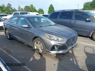 2018 Hyundai Sonata SEL z VIN 5NPE34AFXJH629342, wystawiony jako IAAI lot #42201503 z przebiegiem 122 664 mil mil oraz . Historia ofert i sprzedaży dostępna na DreamBid. Obrazek 1.
