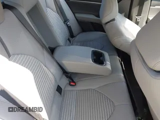 2023 Toyota Camry SE z VIN 4T1G11BK6PU096991, wystawiony jako IAAI lot #42062219 z przebiegiem 82 824 mil mil oraz . Historia ofert i sprzedaży dostępna na DreamBid. Obrazek 8.