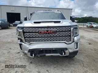2020 GMC Sierra 2500HD Denali z VIN 1GT49REY7LF319360, wystawiony jako Copart lot #59770565 z przebiegiem 69 509 mil mil oraz Nie do naprawy • Non repairable. Historia ofert i sprzedaży dostępna na DreamBid. Obrazek 5.