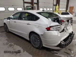 2018 Ford Fusion Titanium with VIN 3FA6P0RU1JR185937, listed as a IAAI auction lot 41863378 with 133,641 mi miles and . Bid and sale history available at DreamBid. Image 3.