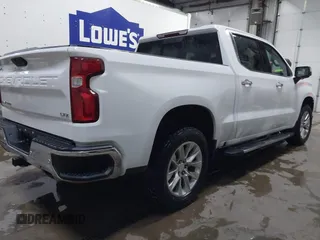 2021 Chevrolet Silverado 1500 LTZ with VIN 3GCUYGED5MG406503, listed as a IAAI auction lot 41293078 with 63,439 mi miles and . Bid and sale history available at DreamBid. Image 4.