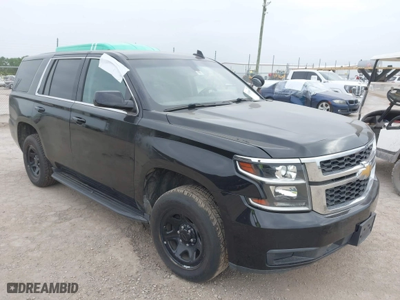 2019 Chevrolet Tahoe Commercial with VIN 1GNLCDECXKR231072, listed as a IAAI auction lot 41800007 with 100,101 mi miles. Bid and sale history available at carsss.com. Image 1.